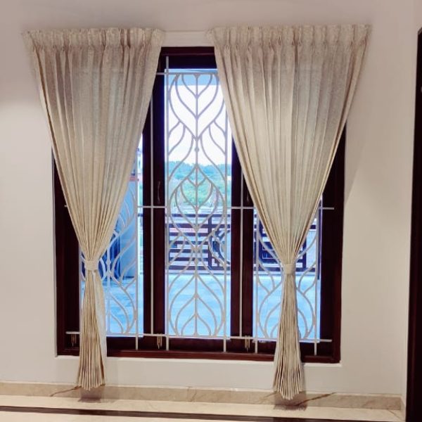 Main Curtains with sheer Curtains and double Rods