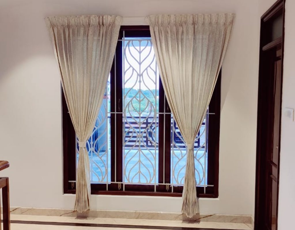 Main Curtains with sheer Curtains and double Rods