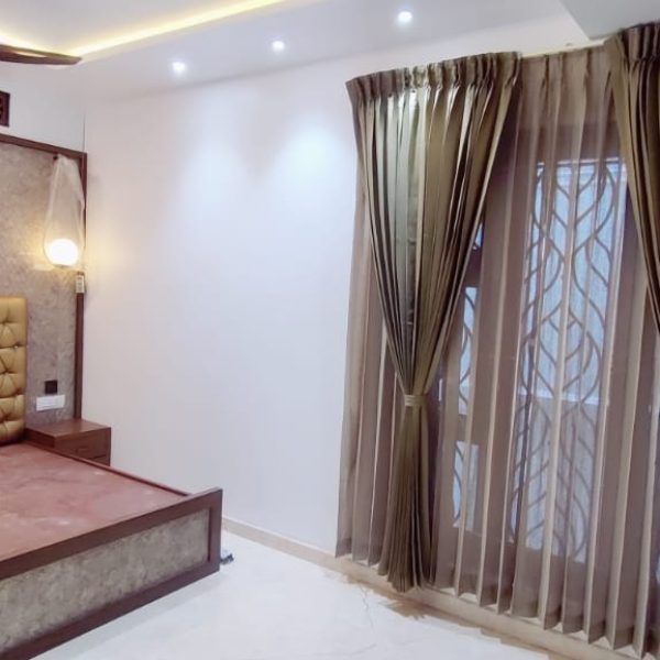 Main Curtains with sheer Curtains and double Rods