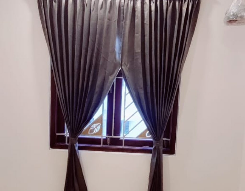 Main Curtains with sheer Curtains and double Rods